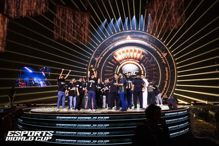 Professional esports players competing on stage